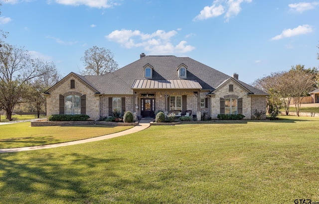 view of front of home with a front yard