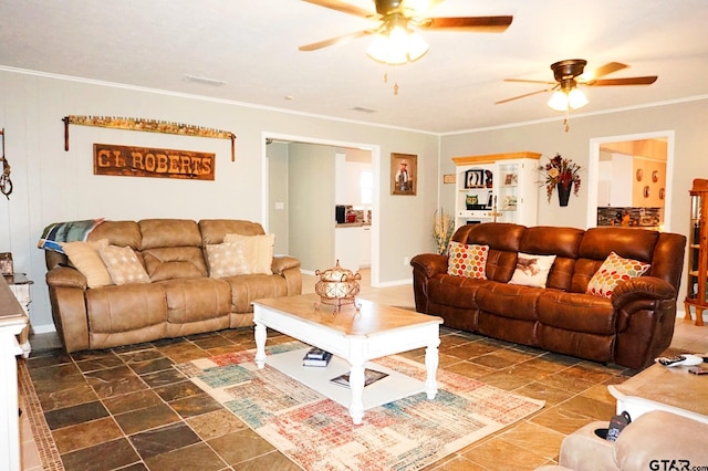 living room featuring ceiling fan and crown molding