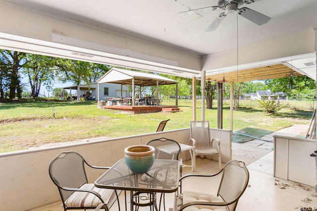 view of patio with ceiling fan