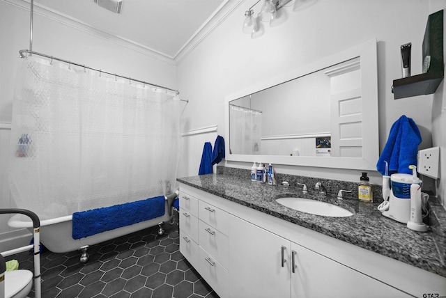 bathroom featuring vanity, tile patterned floors, and ornamental molding