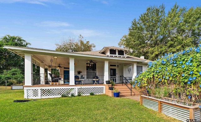 deck featuring ceiling fan and a porch