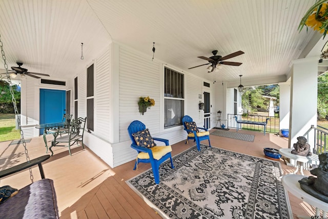 view of patio with a porch and ceiling fan