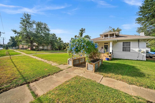 view of front of home with a front yard