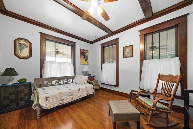 bedroom with hardwood / wood-style flooring, beamed ceiling, ceiling fan, and ornamental molding