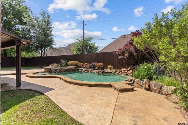 2312 Pinehurst Dr, Tyler, TX 75703 - view of swimming pool featuring a fenced backyard, a patio, and a pool with connected hot tub