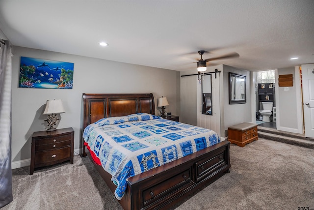 bedroom with a textured ceiling, carpet flooring, and ceiling fan