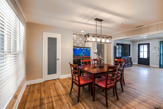 dining room featuring wood-type flooring