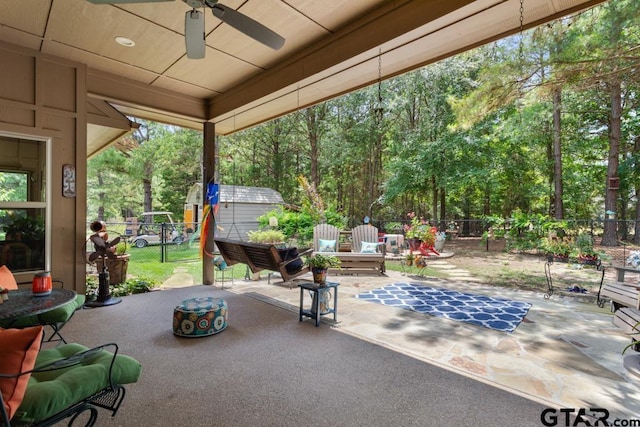 194 Pack Saddle Rdg, Holly Lake Ranch, TX 75765 - fenced backyard with a patio area and a ceiling fan