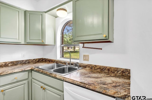 415 Lonestar Ln, Hideaway, TX 75771 - kitchen with a sink, green cabinets, white dishwasher, and dark countertops