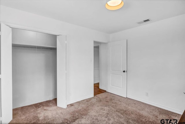 415 Lonestar Ln, Hideaway, TX 75771 - unfurnished bedroom with carpet floors and a closet
