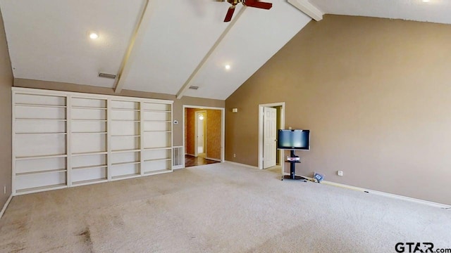 415 Amberwood Cir, Tyler, TX 75701 - unfurnished living room featuring a ceiling fan, beamed ceiling, baseboards, carpet floors, and high vaulted ceiling