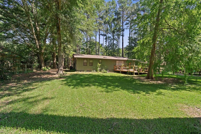 view of yard featuring a deck