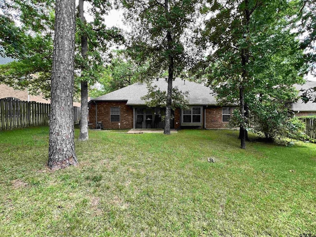 5609 Andover Dr, Tyler, TX 75707 - view of yard with a fenced backyard