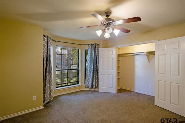 5609 Andover Dr, Tyler, TX 75707 - unfurnished bedroom with carpet floors, a ceiling fan, baseboards, and a closet