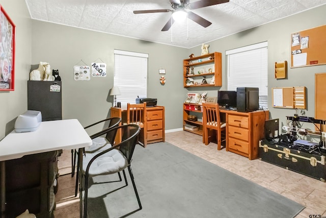 office space with ceiling fan