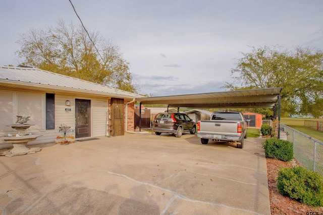 exterior space featuring a carport