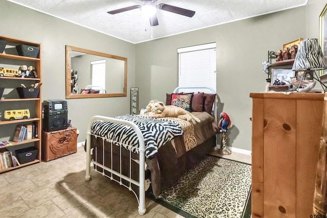 bedroom featuring ceiling fan