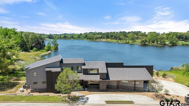 exterior space with a view of trees