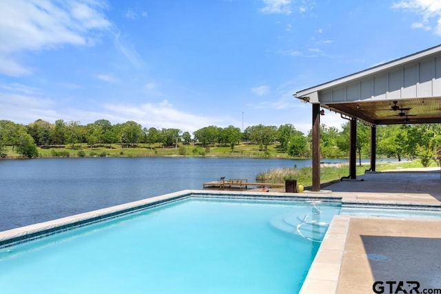 pool featuring a water view and ceiling fan
