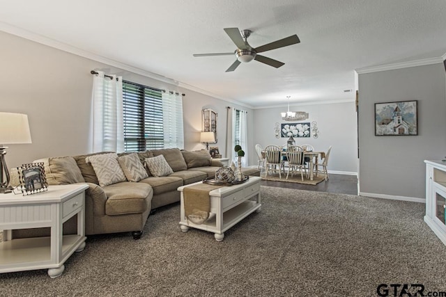 living room featuring dark carpet, crown molding, baseboards, and ceiling fan with notable chandelier