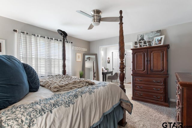 bedroom featuring ceiling fan and light colored carpet