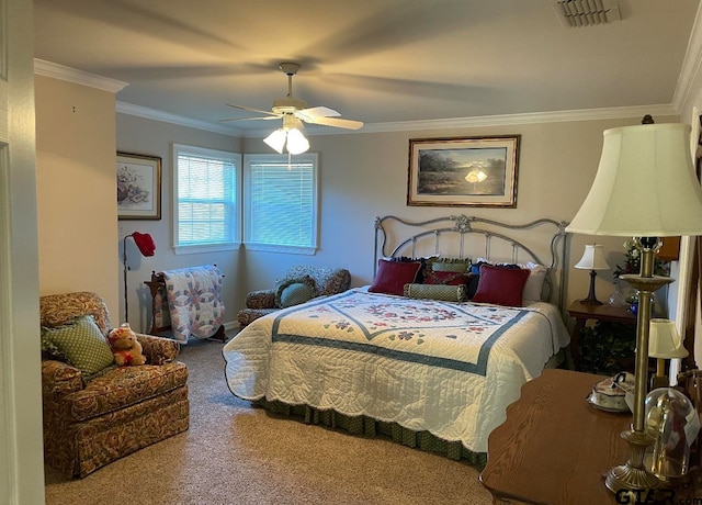 bedroom featuring carpet, ceiling fan, and crown molding