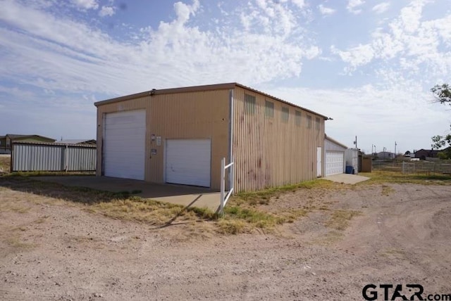 view of outdoor structure with a garage