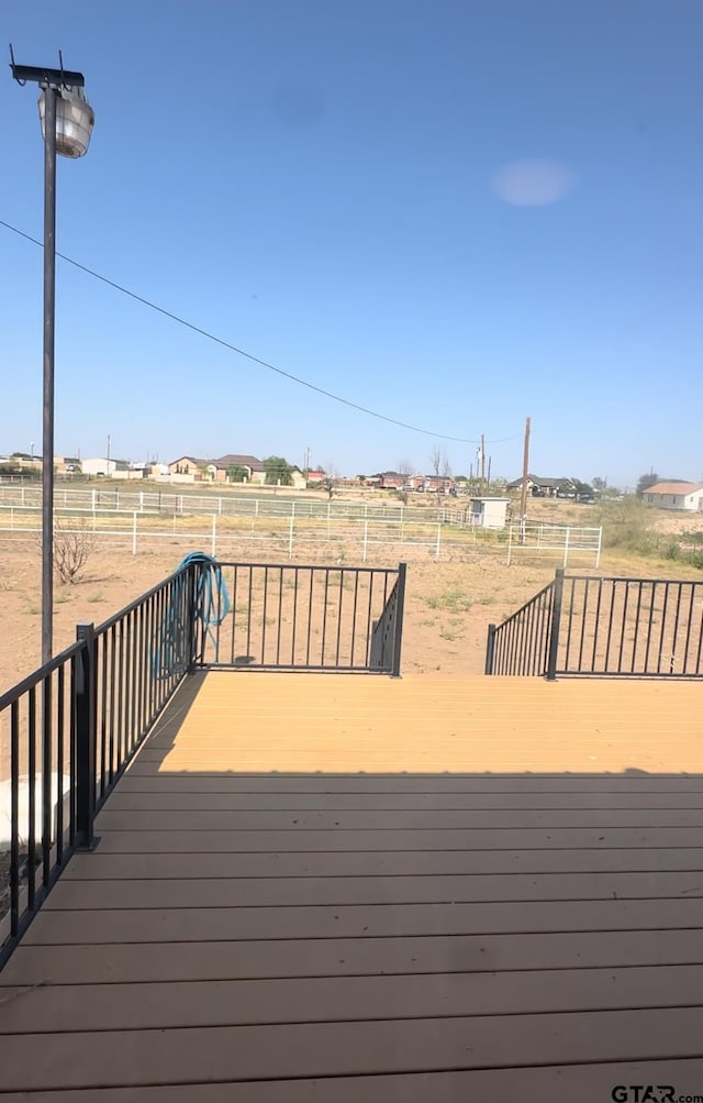 deck with a rural view