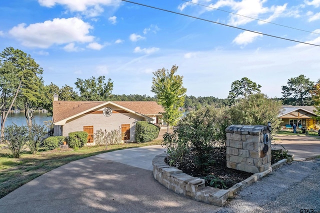 view of front of house featuring a water view