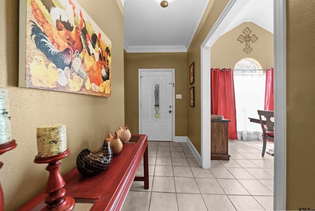 entryway featuring lofted ceiling, light tile patterned floors, and crown molding