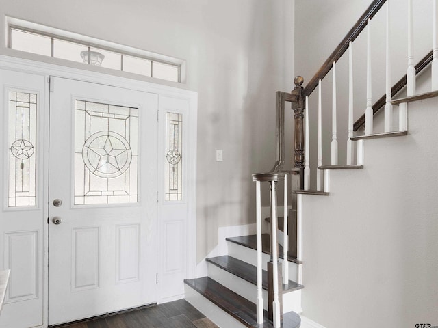 221 Wood Duck Ln, Gilmer, TX 75645 - entryway featuring stairway, dark wood finished floors, plenty of natural light, and baseboards