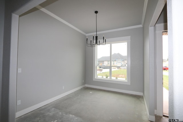 unfurnished dining area featuring crown molding, a chandelier, and concrete floors