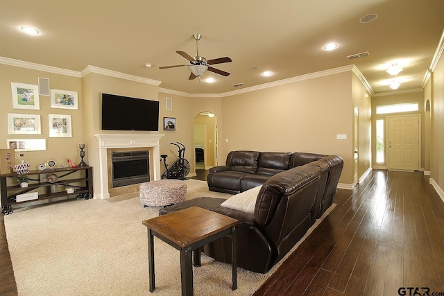 10821 Cactus Trl, Flint, TX 75762 - living room featuring arched walkways, a ceiling fan, crown molding, recessed lighting, and dark wood-type flooring