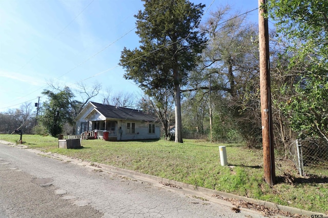 view of front of property with a front lawn