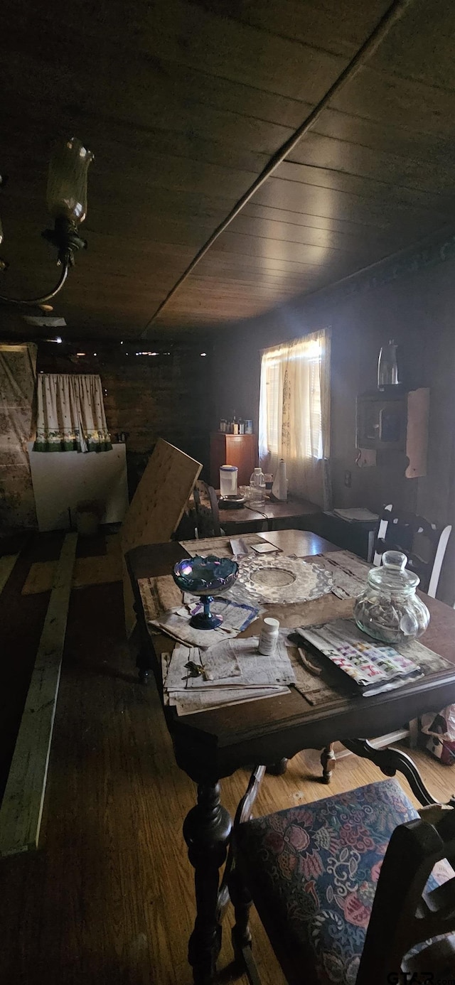 miscellaneous room with wood finished floors and wood ceiling