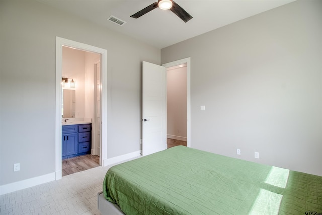 12240 Jazmin Cir, Flint, TX 75762 - bedroom with connected bathroom and a ceiling fan