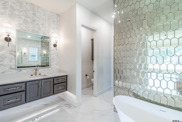 12240 Jazmin Cir, Flint, TX 75762 - bathroom with a freestanding bath, vanity, and marble finish floors