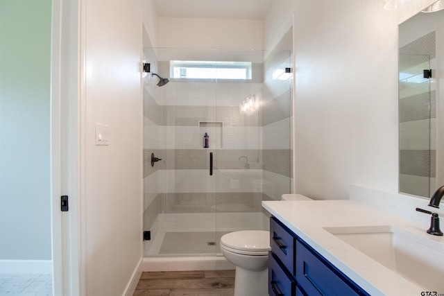 12240 Jazmin Cir, Flint, TX 75762 - bathroom with vanity, a shower stall, and wood finished floors