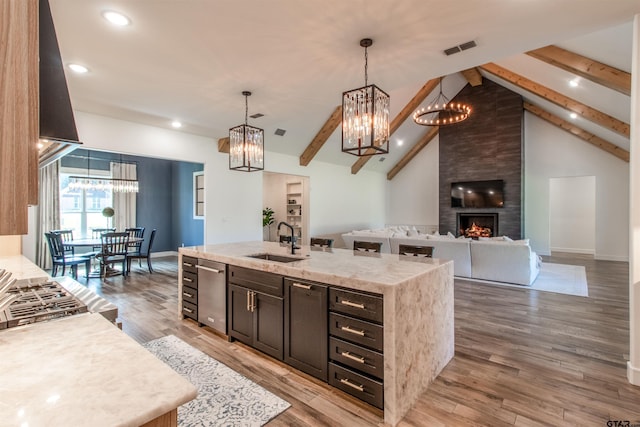 12240 Jazmin Cir, Flint, TX 75762 - kitchen featuring a chandelier, appliances with stainless steel finishes, recessed lighting, a kitchen island with sink, and hanging light fixtures