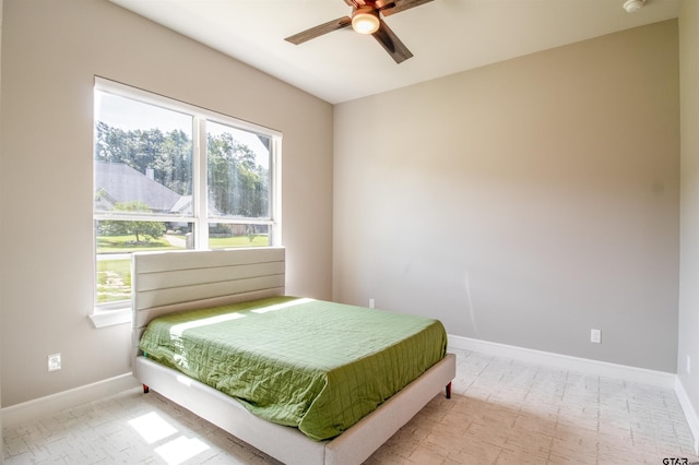 12240 Jazmin Cir, Flint, TX 75762 - bedroom featuring multiple windows and a ceiling fan
