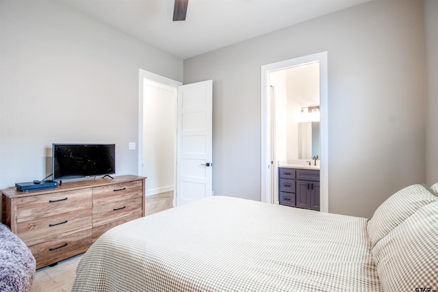 12240 Jazmin Cir, Flint, TX 75762 - bedroom with connected bathroom and a ceiling fan