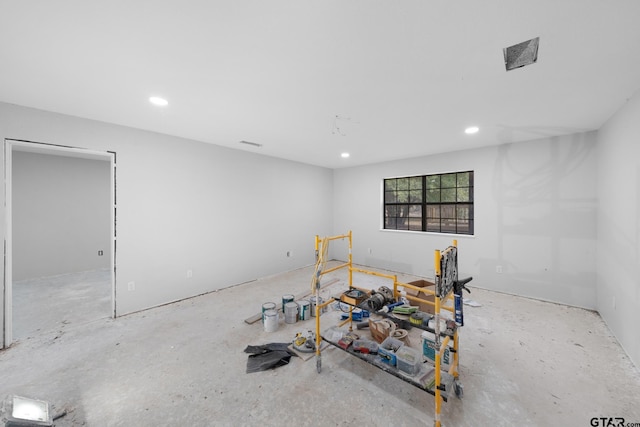 unfurnished room featuring recessed lighting