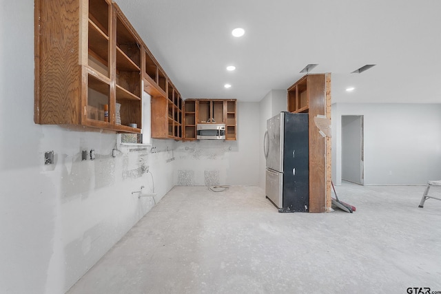 kitchen featuring open shelves, recessed lighting, visible vents, and stainless steel appliances