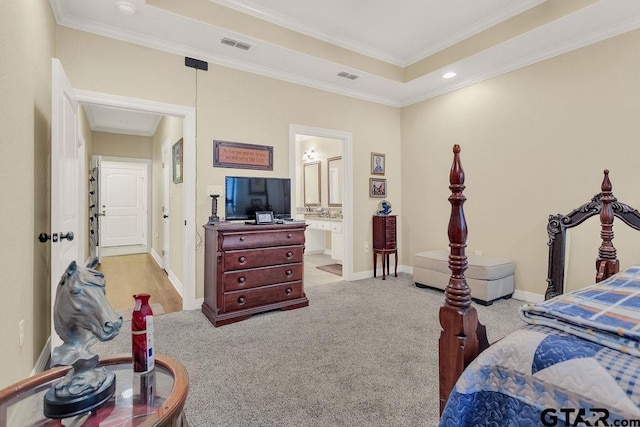1216 Cobblestone Ct, Carthage, TX 75633 - carpeted bedroom with a tray ceiling, crown molding, recessed lighting, and connected bathroom