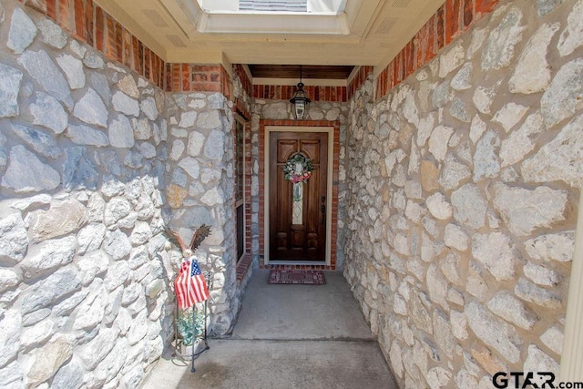 1216 Cobblestone Ct, Carthage, TX 75633 - doorway to property with stone siding