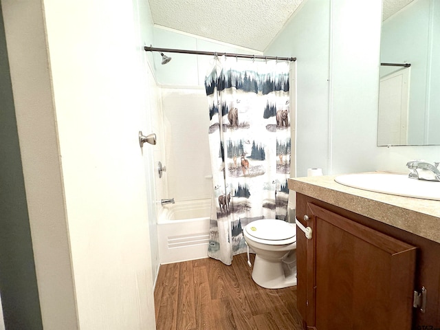 full bathroom featuring a textured ceiling, wood-type flooring, vanity, shower / tub combo with curtain, and toilet