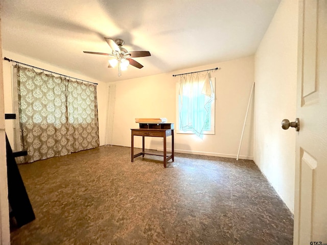 empty room with carpet and ceiling fan