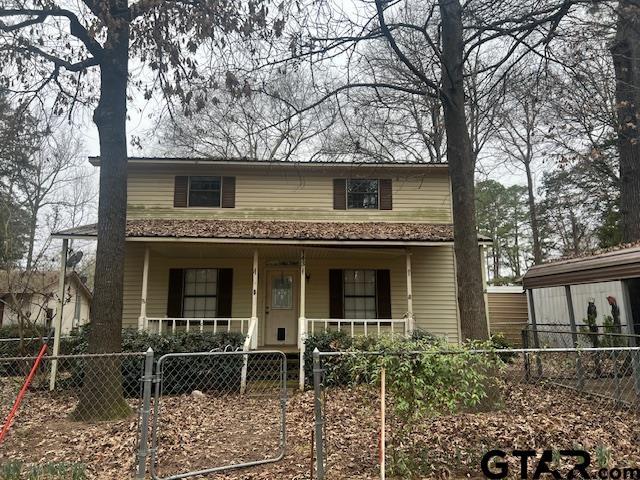 view of property with covered porch