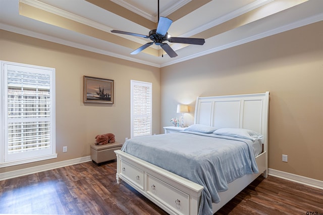 1868 Tall Timber Dr, Tyler, TX 75703 - bedroom featuring a tray ceiling, dark wood finished floors, crown molding, and a ceiling fan