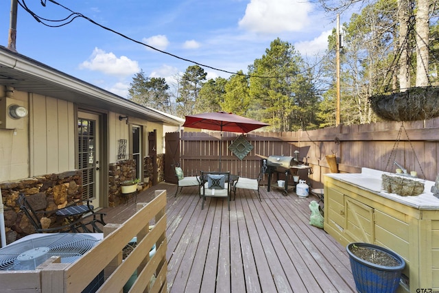 wooden terrace with grilling area